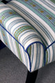 Footstool in Romany Weave Aqua sits at the foot of a botanical bed in a blue and green suite at Covent Garden Hotel, designed by Kit Kemp.